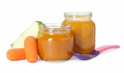 Tasty baby food in jars, fresh carrots and apple isolated on white