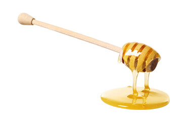 Natural honey dripping from dipper on white background