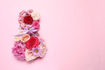8 March greeting card design made with beautiful flowers on pink background, top view. Space for text