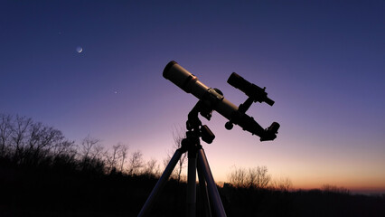 Astronomical telescope for observing stars, planets, Moon, celestial objects.