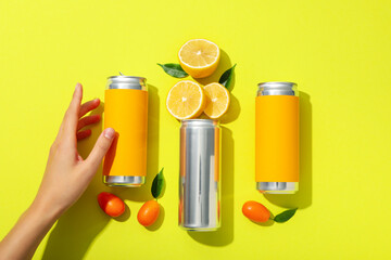 Metal cans with freshly cut juicy lemons