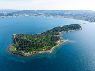 Fototapeta premium Aerial drone view of Urla district of Izmir, Turkey's third largest city. Iskele - Karantina island - Turkey