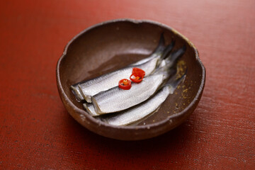 Pickled Scaled sardine (Japanese name is Sappa or Mamakari) in vinegar. Japanese food.