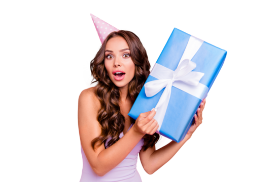 Close up portrait of attractive, pretty, dreamy, astonished wondered cute lovely beautiful lady with big blue bonus or gift in hands isolated on shine pink background with wide open mouth and big eyes