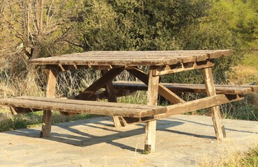 Rustic Retreat: Picnic Table Amidst Nature's Splendor