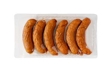 Farmhouse sausages in disposable plastic packing box. Isolated with clipping path.