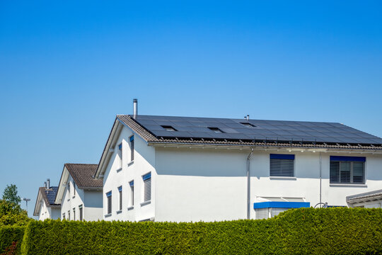 Switzerland, St Gallen Canton, Gommiswald, House roof covered in solar panels