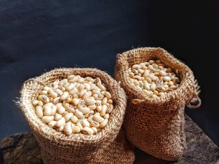 Yellow food soybeans in two gunni sacks