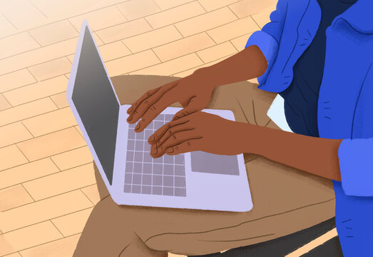 Student typing and studying on laptop