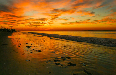 Red sunset over Brighton Beach, New York, USA.