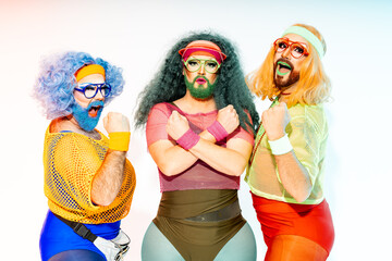 Self Empowered Drag Queens in 80s Sportswear Standing Together