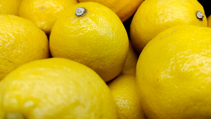 close up view of lemons fruit at the shelf