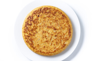 Traditional spanish omelette isolated on white background. Top view