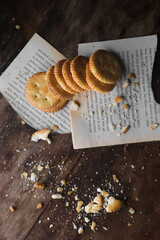 Cookies kept on a wooden table on a dark background