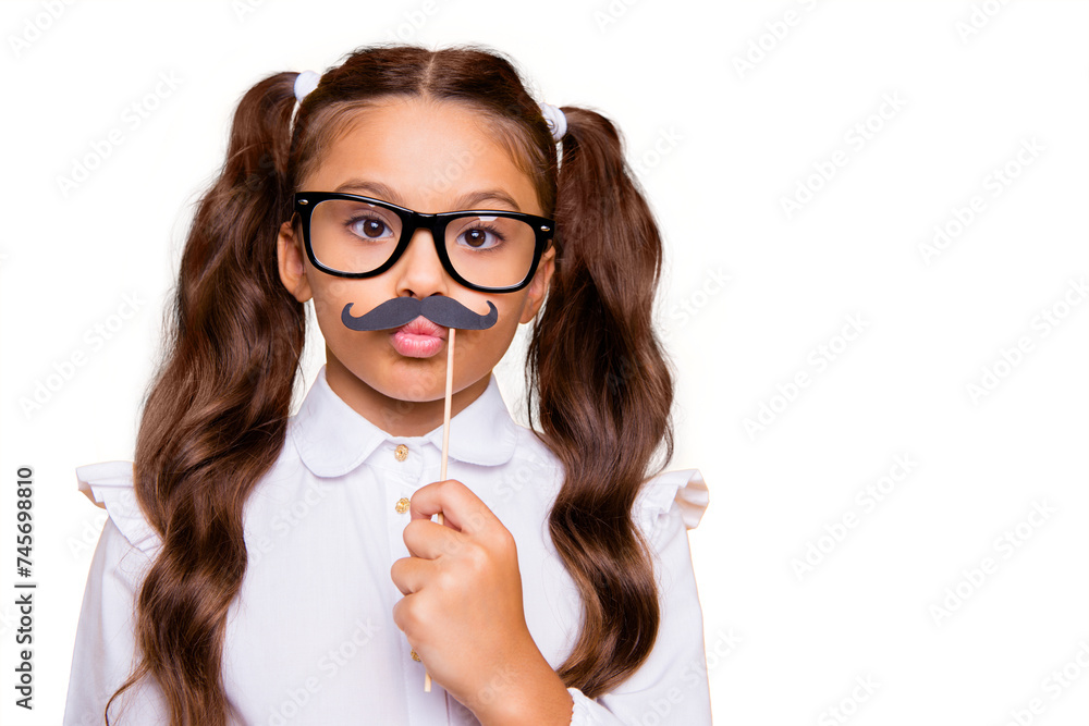 Sticker Free time for fun! Close up portrait of fancy, funky small girl with fake mustache with plump, pouted, blow lips isolated on yellow background with copy space for text