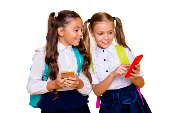 Photo of two cheerful, cute, nice, lovely, sweet small girls isolated on bright yellow background with show each other interesting news on the smartphone screen - Powered by Adobe