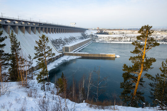 Bratsk hydroelectric power station, Bratsk city, Irkutsk region, Siberia, Russia. Large hydroelectric power station on the Angara River. View of the dam and the hydroelectric power station building.