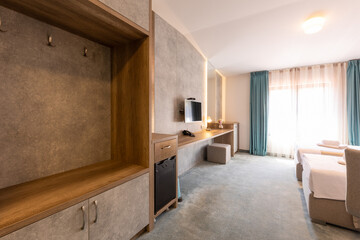 Interior of a double bed hotel bedroom in luxury hotel