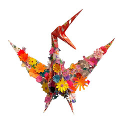 Naklejka premium colorful origami crane adorned with tiny paper flower isolated on transparent background, png