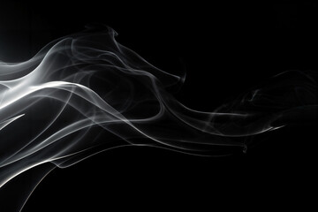 Abstract Smoke Swirls on Black Background.