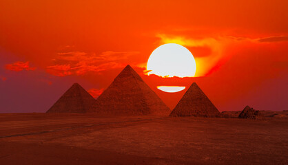 Giza Pyramid Complex at amazing sunset - Cairo, Egypt