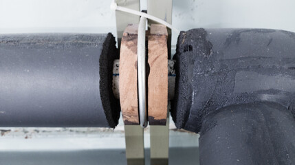 PPR pipe support wooden clamps for cold water in cold water line installations from chillers.