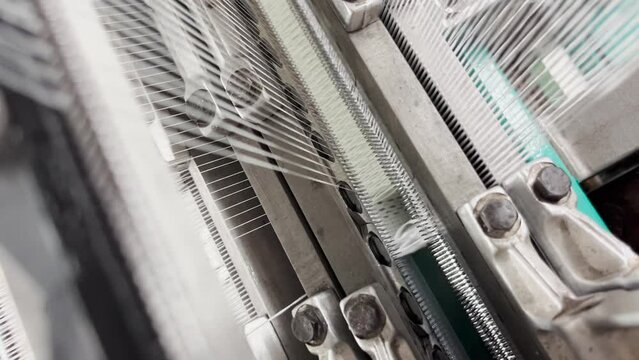 The work of the mechanical parts of the knitting machine