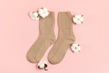Pair of wool socks on a light background