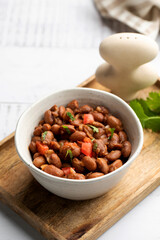  Vegetarian dish of stewed pink beans and tomatoes. A delicious bean dish served 