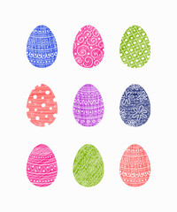 A set of colourful ornate eggs. Easter icons with hand drawn pattern. Vector illustration