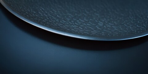 Background texture of the shining metal surface. The curved plate is made of iron.