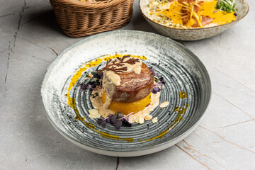 Beef filet mignon with pumpkin puree and cream sauce