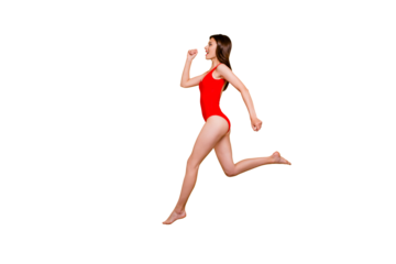 People life energy concept. Full-size portrait of fit sporty girl jumping over in the air isolated on yellow background with copy space for text