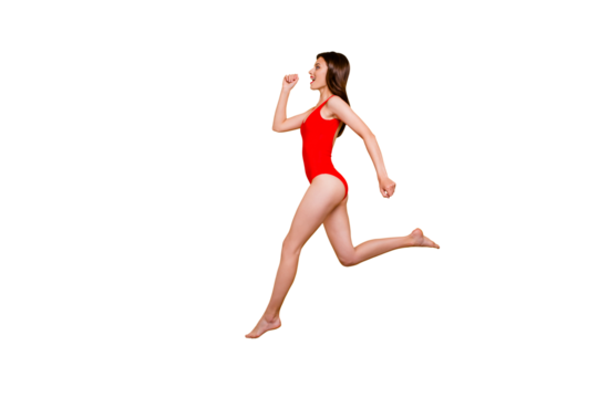 People life energy concept. Full-size portrait of fit sporty girl jumping over in the air isolated on yellow background with copy space for text
