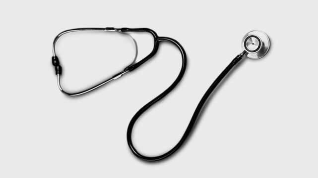 white and black stethoscope on gray background design 