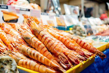 Fresh seafood selling at Kuromon Ichiba in Osaka Japan. The Kuromon Ichiba is a spacious market...