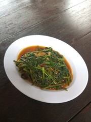 kale vegetables on a white plate