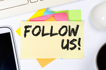 Follow us follower followers fans likes social networking media internet business concept on a desk