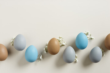 Elegant Easter Composition with Pastel Eggs and Spring Blossoms, still life Dyed eggs in soft...