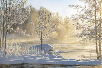 River landscape with frost and snow in a cold morning. Farnebofjarden national park in north of Sweden. - 745790201