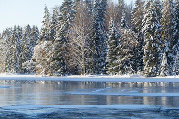 River landscape with frost and snow in a cold morning. Farnebofjarden national park in north of Sweden. - 745790257