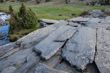 slab bridge over the Lillas river , Sierra Norte de Guadalajara Natural Park, Cantalojas, Guadalajara, Spain