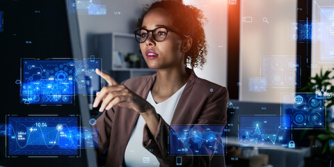 Black woman working in the office and digital technology concept.