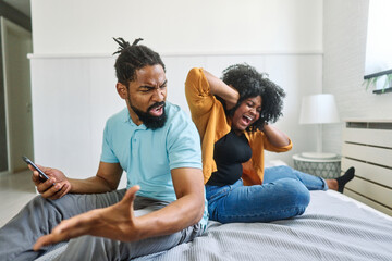 phone woman couple conflict problem man girlfriend mobile boyfriend husband young wife smartphone angry unhappy quarrel mobile phone girl cheating communication - obrazy, fototapety, plakaty