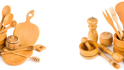 Set of wooden kitchen utensils isolated on white. Collage. Free space for text. Wide photo.