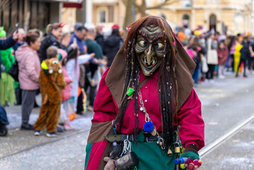  Scary witch looks directly into camera at street carnival, Heidelberg, Germany