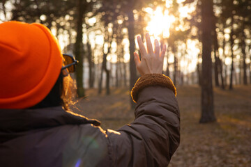 happy Asian girl enjoying life and freedom in autumn in nature