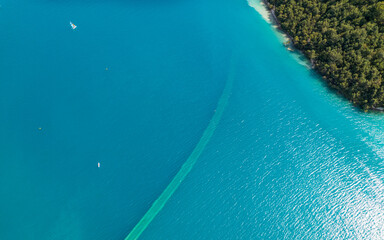 Aerial photo by drone of the Chanteloube bridge drowned in the turquoise waters of the...