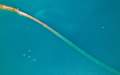 Aerial photo by drone of the Chanteloube bridge drowned in the turquoise waters of the...