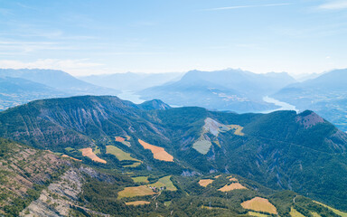 Aerial photography by drone of Mont Colombis in Serre-Ponçon, its mountains, located in the...